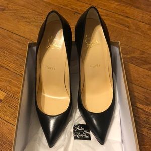 Christian Louboutin black leather pumps